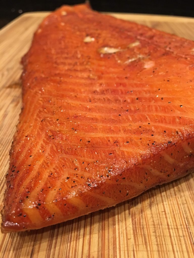 smoked salmon on a cutting board